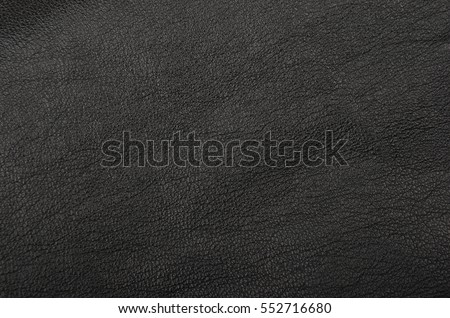 Close up of natural black leather background Royalty-Free Stock Photo #552716680