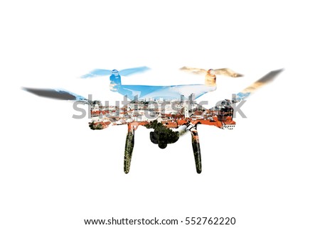 Double exposure. Hovering drone and roofs of buildings in the ci