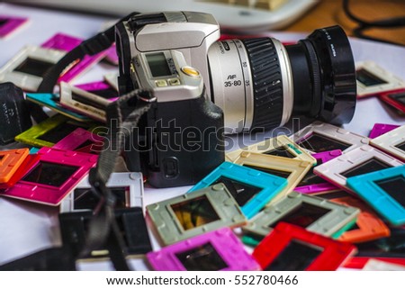 Film camera with multicolored film slides