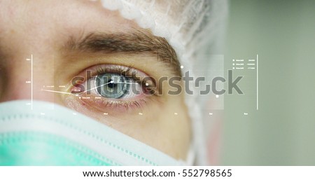 beautiful blue eye, technology, surgeon, medicine Royalty-Free Stock Photo #552798565