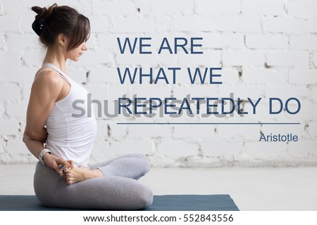Fit woman doing yoga or pilates exercise. Fitness motivation quote with motivational text "We are what we repeatedly do. Aristotle". Healthy lifestyle concept. Model sitting  in Baddha Padmasana pose