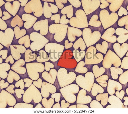little wood heart  on wood background, valentine day concept with selective red heart  area , one love 