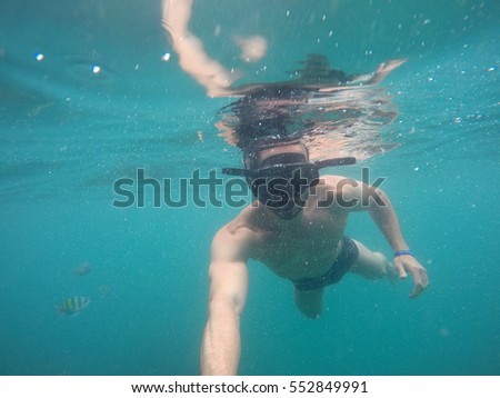 Man taking a selfie Underwater in Thailand