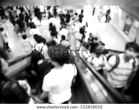 Picture blurred  for background abstract and can be illustration to article of People using the escalator