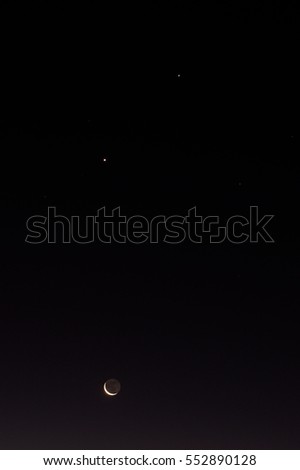 Abstract blurred photo image of moon and the stars on the night sky, minimal concept with copy space for text
