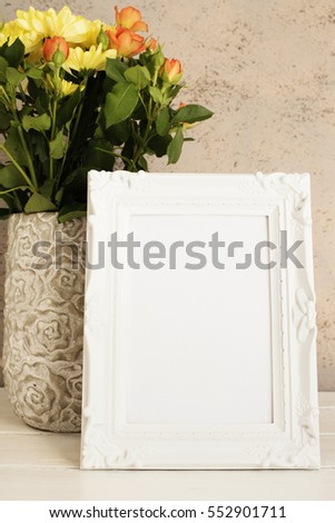 White Frame Mock Up, Digital MockUp, Display Mockup, Styled Stock Photography Mockup. Desktop Mock Up. Rustic vase with roses and yellow chrysanthemums. White background, empty place, copy space.