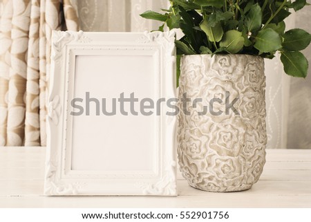 White Frame Mock Ups, Digital MockUp, Display Mockup, Sea Styled Stock Photography Mockup. Rustic vase with orange roses and chrysanthemums. White background, empty place, copy space. Vintage tinted