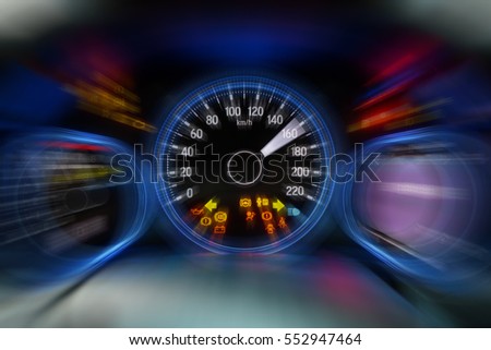 Motion blur of modern car instrument panel dashboard with blue illuminated display and show all led signs, rev up. Royalty-Free Stock Photo #552947464