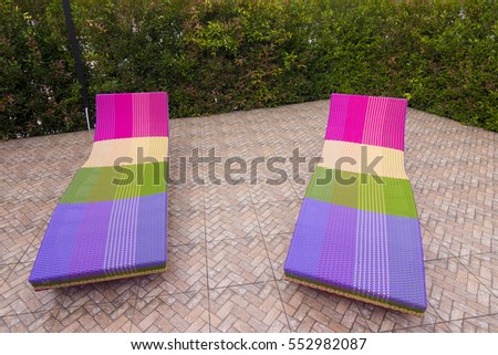 Two Cushion, chair wicker in the garden, Exterior design concept (This chair is common use in thailand)