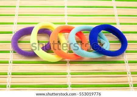 colored rubber bands for hair on the table