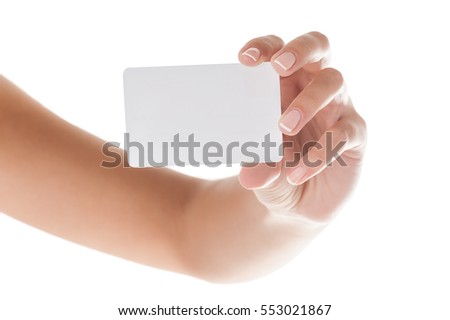 Manicured woman hand holding blank card isolated on white background.