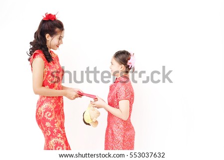 Chinese new year woman concept,  Asian woman wearing red dress give money gift to children. white background
