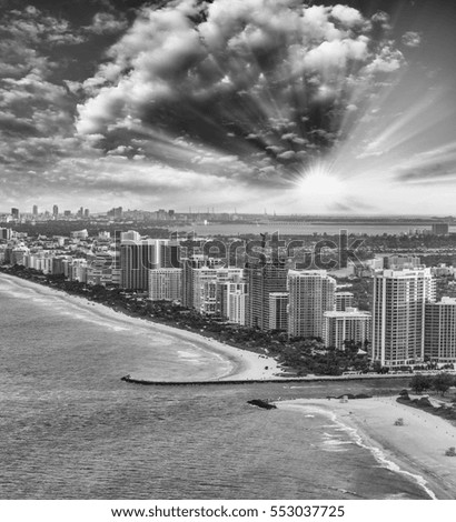 Black and white aerial view of Miami Beach skyline.