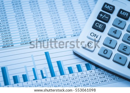Accounting financial banking stock spreadsheet data numbers with calculator in blue. Financial concept. 