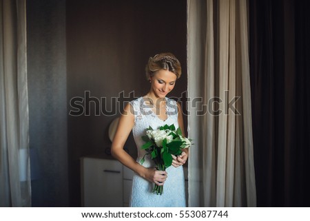 Beautiful wedding bouquet in bride's hand. Waiting for the groom