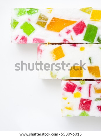 Paste with varicolored fruit pieces. delicacy. sweets. abstract background