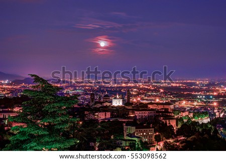 View at Old Town Citta Alta of Bergamo from San Vigilio Hill. Bergamo, Italy. Night view.