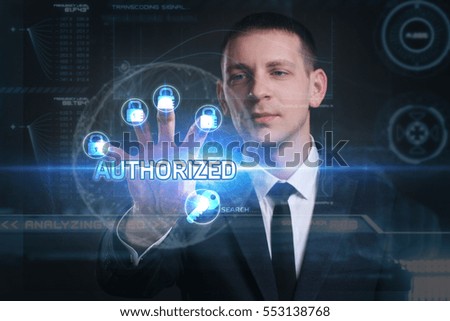 Business, Technology, Internet and network concept. Young businessman working on a virtual screen of the future and sees the inscription: Authorized