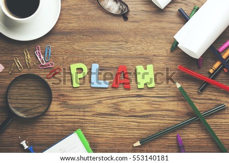 Plan word and office tools on wooden table