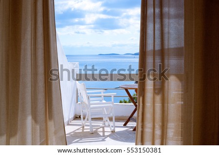 Hotel room with a sea view house near the sea in the environmental and green location on the island. The window overlooking the ocean. The endless expanse of the sea. Place for a romantic holiday.