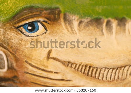 Figure crocodile with smile, close-up