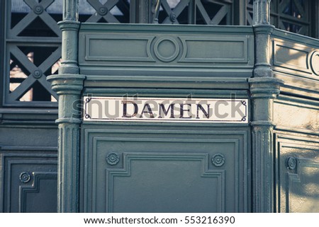 the german word "Damen" (women) at historic public restroom, 