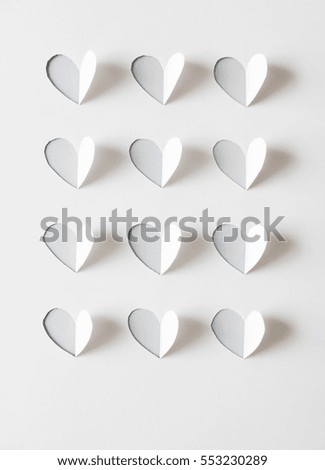 Paper hearts cut from paper.