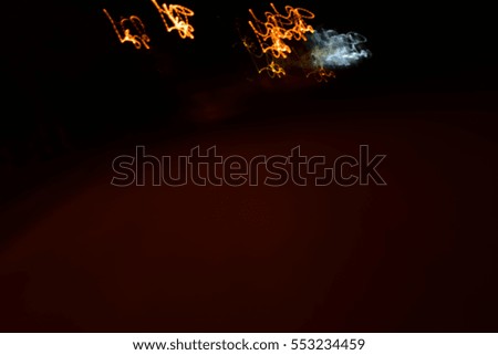 Abstract colorful background with lights in motion