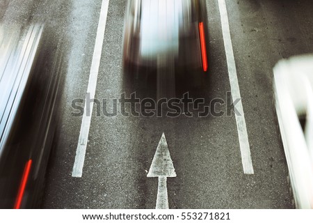 Go forward, Speed car movement on city road, Top view. Royalty-Free Stock Photo #553271821
