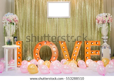 Wedding decoration background with word love light stand.
