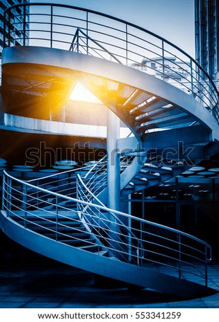 low angle view of Spiral Staircase in blue tone.