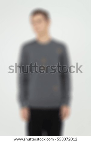 Mens fashion theme creative abstract blur background with bokeh effect. Young man showing new clothes for internet store