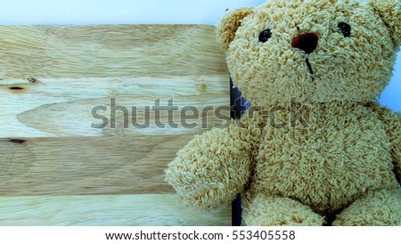 Wooden board with a teddy bearAnd have some space for write wording