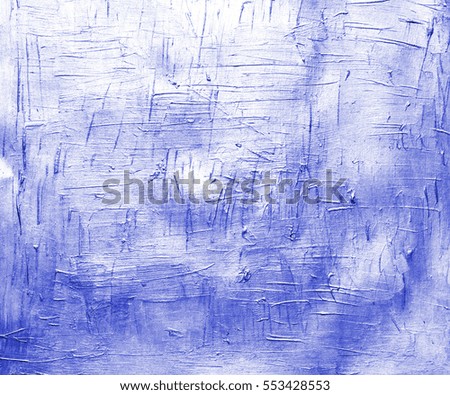 Bright blue painted canvas with brush strokes. Metallic effect background for card or banner template. Silver acrylic paint strokes texture closeup photo. Shiny party invitation or wedding backdrop