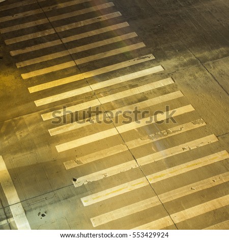 Night sidewalk zebra crossing
