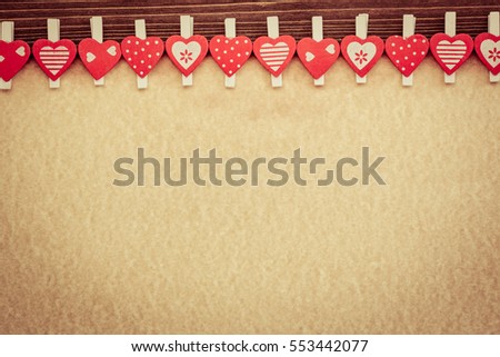 Valentines day ornament on old paper background. Greeting card