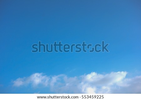 clouds in the blue sky. Beautiful Blue Sky Background Template With Some Space for Input Text Message Below Isolated on Blue