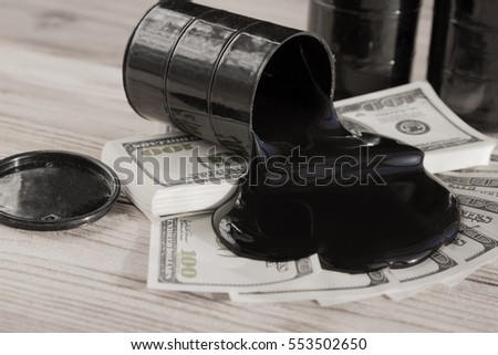 oil and barrels. poured oil on the money dollar currency. bargaining. Exchange. oil business. Profit growth rates, profit from sales of petroleum products.