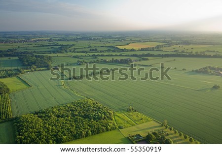 view over the early summer green fields from the air; East Anglia; UK Royalty-Free Stock Photo #55350919