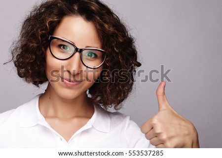 lifestyle  and people concept: Happy woman giving thumb up