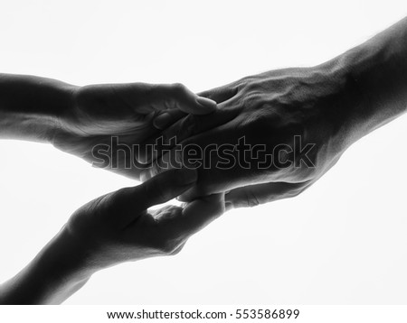 Touching hands silhouette man woman white background couple feeling love. Man woman hold hands silhouette white background. Couple Holding Hands Closeup. Black and white photo