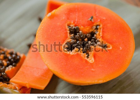 Sweet papaya cut in the kitchen