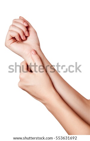 Closeup view of a young woman with pain on hand. isolated on white background.
