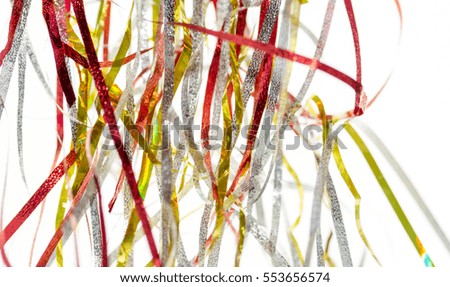 Tinsel Christmas decoration. Isolated on a white background