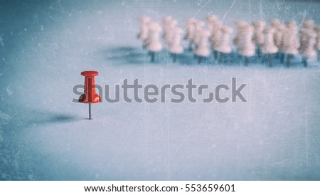 thumbtacks pinned arrange to symbolize on wooden table to be different or leadership or bravery with copy space, vintage tone Royalty-Free Stock Photo #553659601