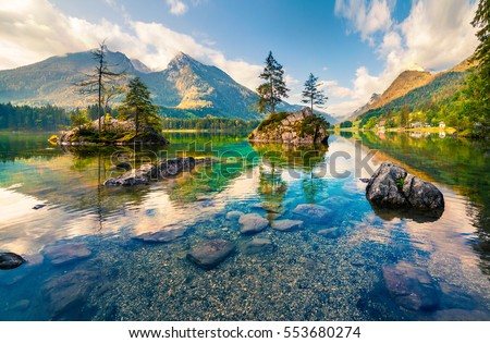 Beautiful summer morning on the Hintersee lake. Colorful outdoor scene in the Austrian Alps, Salzburg-Umgebung district, Austria, Europe. Artistic style post processed photo.