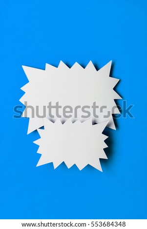Blank promotional signs on a bright blue background