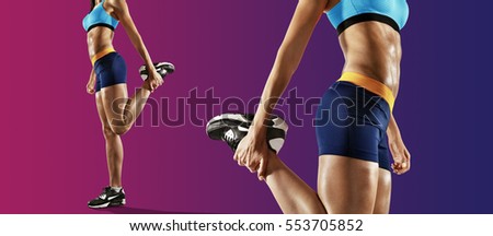 Sports background. Stretching. Young fitness woman  stretching legs. Isolated