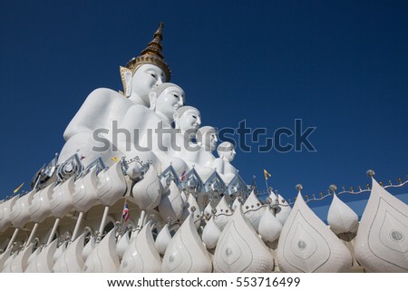 Big white buddha statue isolated on blue sky at new popular Public Temple in Phetchabun (in the north of Thailand) "Wat Pha Sorn
Kaew" Picture in January, 2017