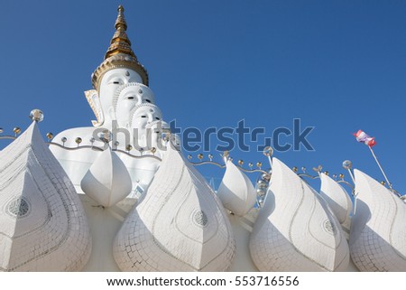 Big white buddha statue isolated on blue sky at new popular Public Temple in Phetchabun (in the north of Thailand) "Wat Pha Sorn
Kaew" Picture in January, 2017